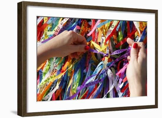 Woman Tying Lucky Ribbon at Igreja Nosso Senhor do Bonfim Church, Salvador, Bahia, Brazil-Yadid Levy-Framed Photographic Print