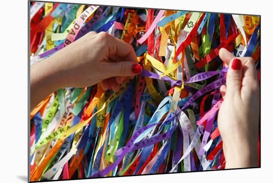 Woman Tying Lucky Ribbon at Igreja Nosso Senhor do Bonfim Church, Salvador, Bahia, Brazil-Yadid Levy-Mounted Photographic Print