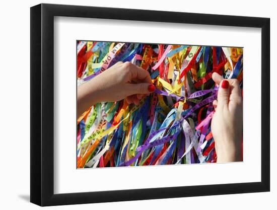 Woman Tying Lucky Ribbon at Igreja Nosso Senhor do Bonfim Church, Salvador, Bahia, Brazil-Yadid Levy-Framed Photographic Print