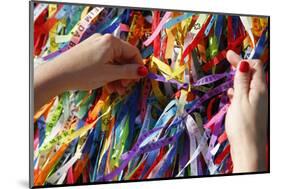 Woman Tying Lucky Ribbon at Igreja Nosso Senhor do Bonfim Church, Salvador, Bahia, Brazil-Yadid Levy-Mounted Photographic Print