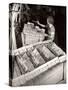 Woman Typing Up Bundles of Paper Bags as They are by Machine Inthe Union Bag and Paper Co. Factory-Margaret Bourke-White-Stretched Canvas