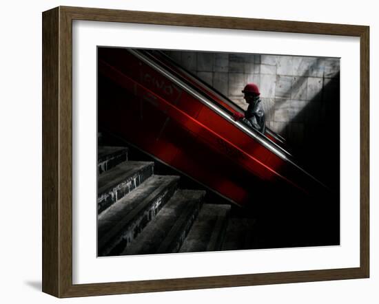 Woman Uses an Escalator at a Pedestrian Underpass in Belgrade, Serbia-null-Framed Photographic Print