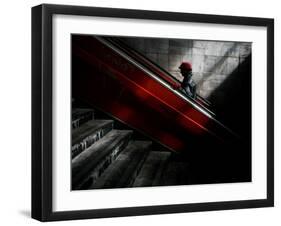 Woman Uses an Escalator at a Pedestrian Underpass in Belgrade, Serbia-null-Framed Photographic Print