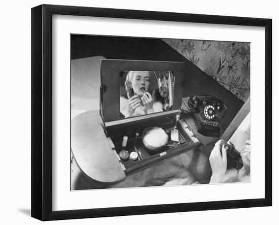 Woman Using a Swing Table to Put on Her Make-Up-Bernard Hoffman-Framed Photographic Print