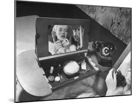 Woman Using a Swing Table to Put on Her Make-Up-Bernard Hoffman-Mounted Photographic Print