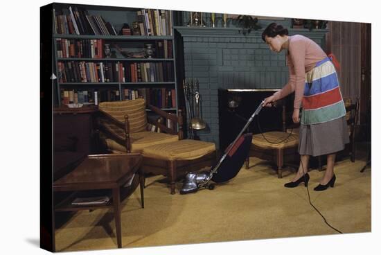 Woman Vacuuming Living Room-William P. Gottlieb-Stretched Canvas