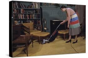 Woman Vacuuming Living Room-William P. Gottlieb-Stretched Canvas