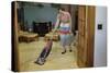 Woman Vacuuming Living Room-William P. Gottlieb-Stretched Canvas