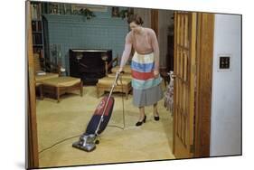 Woman Vacuuming Living Room-William P. Gottlieb-Mounted Photographic Print