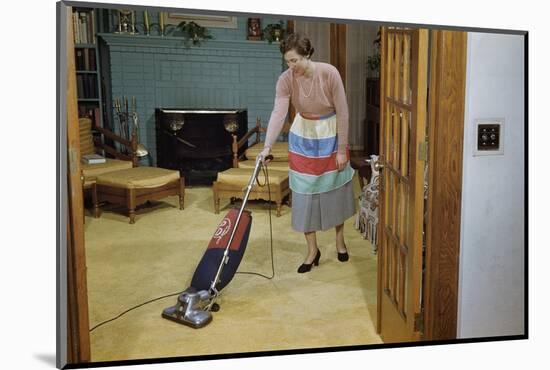 Woman Vacuuming Living Room-William P. Gottlieb-Mounted Photographic Print