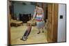 Woman Vacuuming Living Room-William P. Gottlieb-Mounted Photographic Print