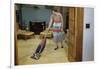 Woman Vacuuming Living Room-William P. Gottlieb-Framed Photographic Print
