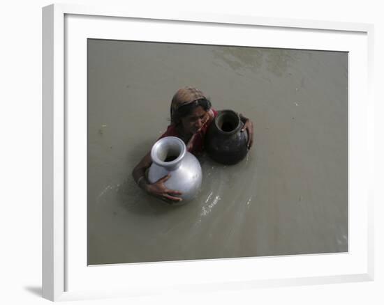 Woman Wades Through Flood Waters to Collect Drinking Water at Kakadhowa Village in India-null-Framed Photographic Print