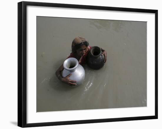 Woman Wades Through Flood Waters to Collect Drinking Water at Kakadhowa Village in India-null-Framed Photographic Print