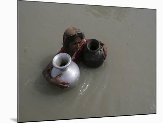 Woman Wades Through Flood Waters to Collect Drinking Water at Kakadhowa Village in India-null-Mounted Photographic Print