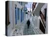 Woman Walking Down an Alley, Mykonos Town, Mykonos, Greece-Doug Pearson-Stretched Canvas