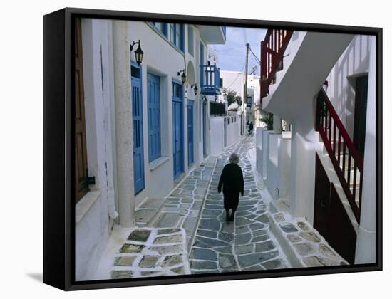 Woman Walking Down an Alley, Mykonos Town, Mykonos, Greece-Doug Pearson-Framed Stretched Canvas