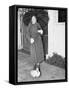 Woman Walking in the Rain with a Duck on a Leash-null-Framed Stretched Canvas