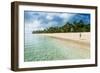 Woman Walking on a Palm Fringed White Sand Beach in Ha'Apai Islands, Tonga, South Pacific-Michael Runkel-Framed Photographic Print