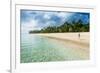 Woman Walking on a Palm Fringed White Sand Beach in Ha'Apai Islands, Tonga, South Pacific-Michael Runkel-Framed Photographic Print