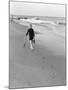 Woman Walking on Beach Leaving Footprints-Philip Gendreau-Mounted Photographic Print