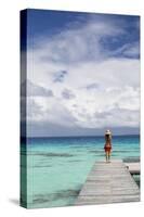 Woman Walking on Jetty, Fakarava, Tuamotu Islands, French Polynesia (Mr)-Ian Trower-Stretched Canvas