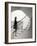 Woman walking up staircase holding handrail-John Edward Linden-Framed Photo