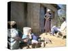 Woman Washing Clothes Outside Shack, Godet, Haiti, Island of Hispaniola-Lousie Murray-Stretched Canvas