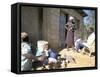 Woman Washing Clothes Outside Shack, Godet, Haiti, Island of Hispaniola-Lousie Murray-Framed Stretched Canvas