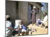 Woman Washing Clothes Outside Shack, Godet, Haiti, Island of Hispaniola-Lousie Murray-Mounted Photographic Print