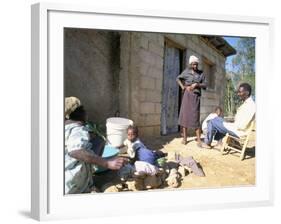 Woman Washing Clothes Outside Shack, Godet, Haiti, Island of Hispaniola-Lousie Murray-Framed Photographic Print