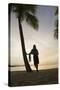 Woman Watching Sunset on Beach-Macduff Everton-Stretched Canvas