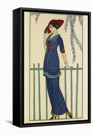 Woman wearing a beach dress and a raw silk scarf and a red hat-Georges Barbier-Framed Stretched Canvas