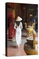 Woman Wearing Ao Dai Dress at Ha Chuong Hoi Quan Pagoda, Cholon, Ho Chi Minh City, Vietnam-Ian Trower-Stretched Canvas