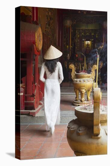 Woman Wearing Ao Dai Dress at Ha Chuong Hoi Quan Pagoda, Cholon, Ho Chi Minh City, Vietnam-Ian Trower-Stretched Canvas