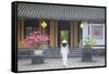 Woman Wearing Ao Dai Dress at Left House Inside Citadel, Hue, Thua Thien-Hue, Vietnam, Indochina-Ian Trower-Framed Stretched Canvas