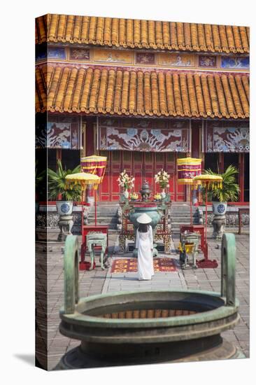 Woman Wearing Ao Dai Dress at Mieu Temple Inside Citadel, Hue, Thua Thien-Hue, Vietnam, Indochina-Ian Trower-Stretched Canvas