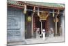 Woman Wearing Ao Dai Dress at Nghia an Hoi Quan Pagoda, Cholon, Ho Chi Minh City, Vietnam-Ian Trower-Mounted Photographic Print