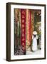 Woman Wearing Ao Dai Dress at Phuoc an Hoi Quan Pagoda, Cholon, Ho Chi Minh City, Vietnam-Ian Trower-Framed Premium Photographic Print