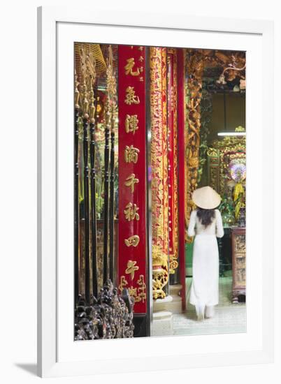 Woman Wearing Ao Dai Dress at Phuoc an Hoi Quan Pagoda, Cholon, Ho Chi Minh City, Vietnam-Ian Trower-Framed Photographic Print