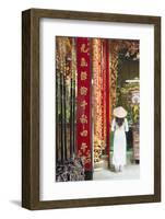 Woman Wearing Ao Dai Dress at Phuoc an Hoi Quan Pagoda, Cholon, Ho Chi Minh City, Vietnam-Ian Trower-Framed Photographic Print