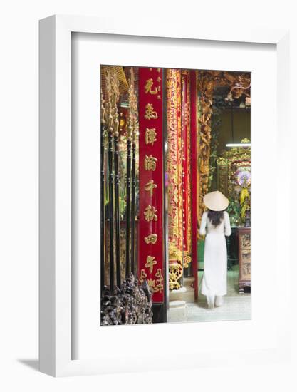 Woman Wearing Ao Dai Dress at Phuoc an Hoi Quan Pagoda, Cholon, Ho Chi Minh City, Vietnam-Ian Trower-Framed Photographic Print