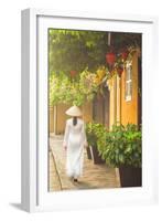 Woman Wearing Ao Dai Dress Walking Along Street, Hoi An, Quang Ham, Vietnam-Ian Trower-Framed Photographic Print