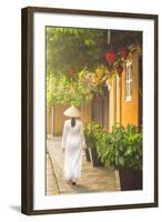 Woman Wearing Ao Dai Dress Walking Along Street, Hoi An, Quang Ham, Vietnam-Ian Trower-Framed Photographic Print
