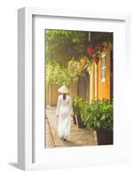 Woman Wearing Ao Dai Dress Walking Along Street, Hoi An, Quang Ham, Vietnam-Ian Trower-Framed Photographic Print