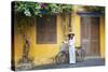 Woman Wearing Ao Dai Dress with Bicycle, Hoi An, Quang Ham, Vietnam-Ian Trower-Stretched Canvas