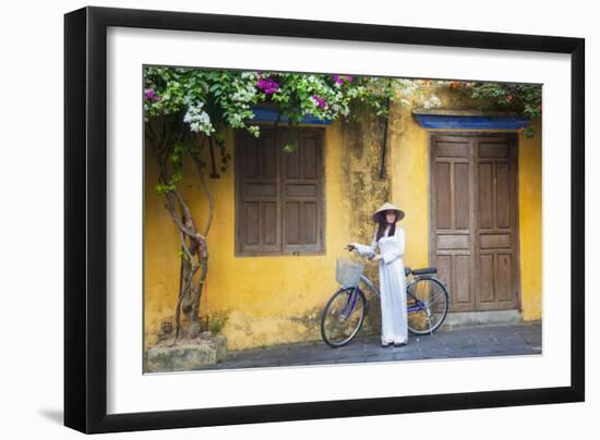 Woman Wearing Ao Dai Dress with Bicycle, Hoi An, Quang Ham, Vietnam-Ian Trower-Framed Photographic Print