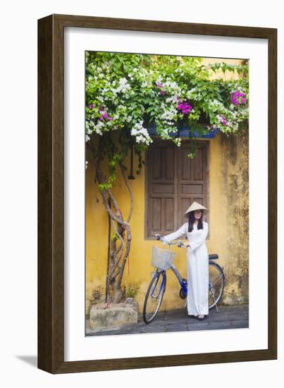 Woman Wearing Ao Dai Dress with Bicycle, Hoi An, Quang Ham, Vietnam-Ian Trower-Framed Photographic Print