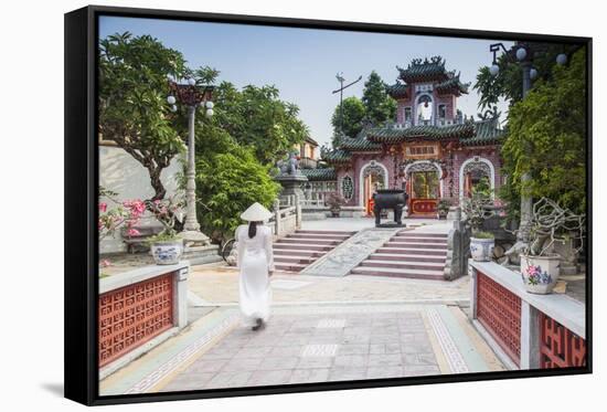 Woman Wearing Ao Dai Dress-Ian Trower-Framed Stretched Canvas