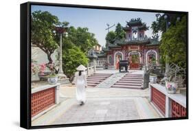 Woman Wearing Ao Dai Dress-Ian Trower-Framed Stretched Canvas